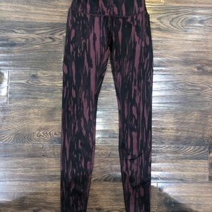 LULULEMON. SIZE 4. purple and black zebra print leggings